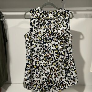 L tank top that looks great alone or under blazers.